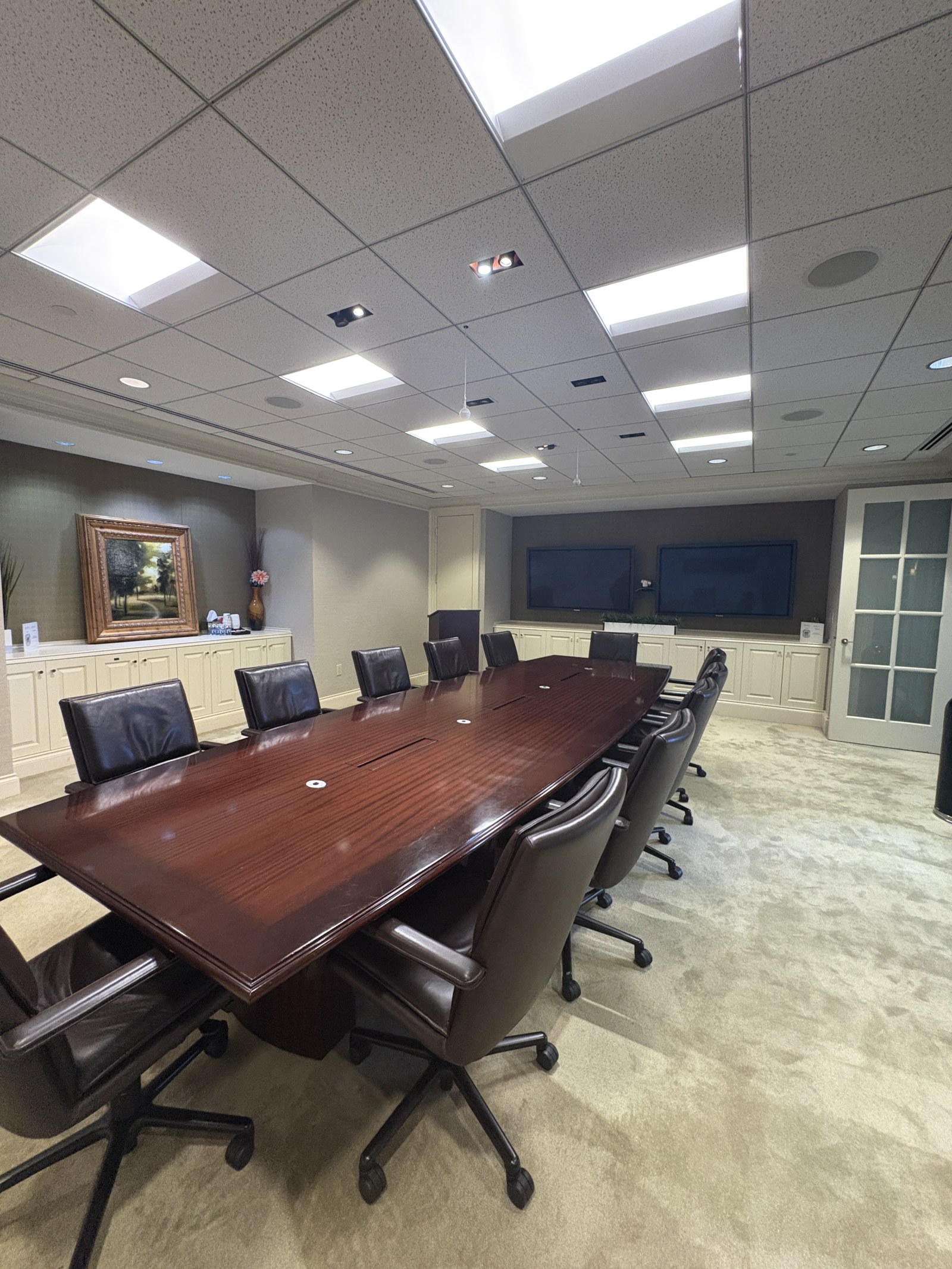 Conference room with dark wood table at One Atlantic Center